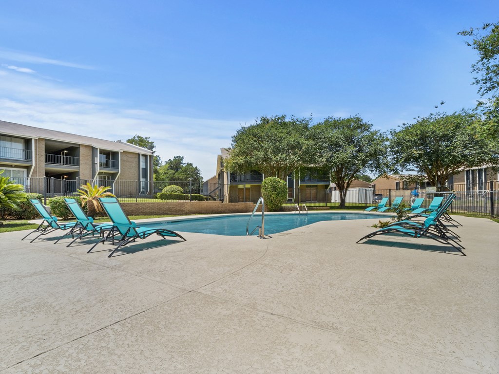 our apartments have a resort style pool with chaise lounge chairs