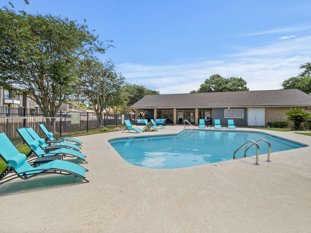 our apartments have a swimming pool with chaise lounge chairs