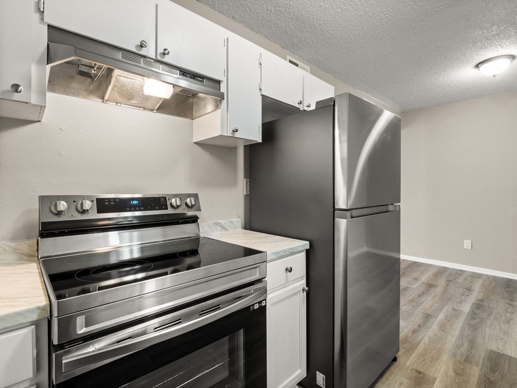 the preserve at ballantyne commons apartment kitchen with stainless steel appliances