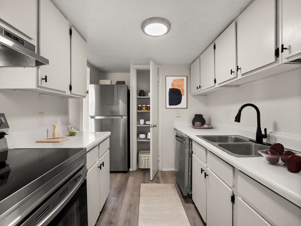 the preserve at ballantyne commons apartment kitchen with stainless steel appliances