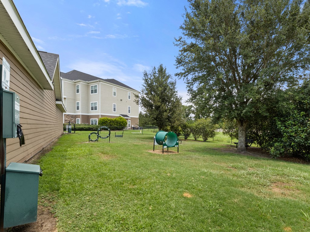 the preserve at ballantyne commons community yard with playground and apartment buildings