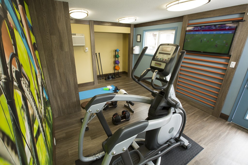 Abby creek fitness center with elliptical and tv