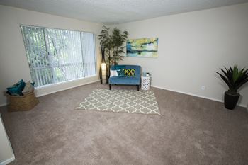 Model home living room at Abby Creek Apartments, Carmichael, CA 