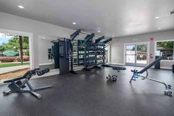 Fitness Center with large windows at Rivercrest Apartments, Sacramento 