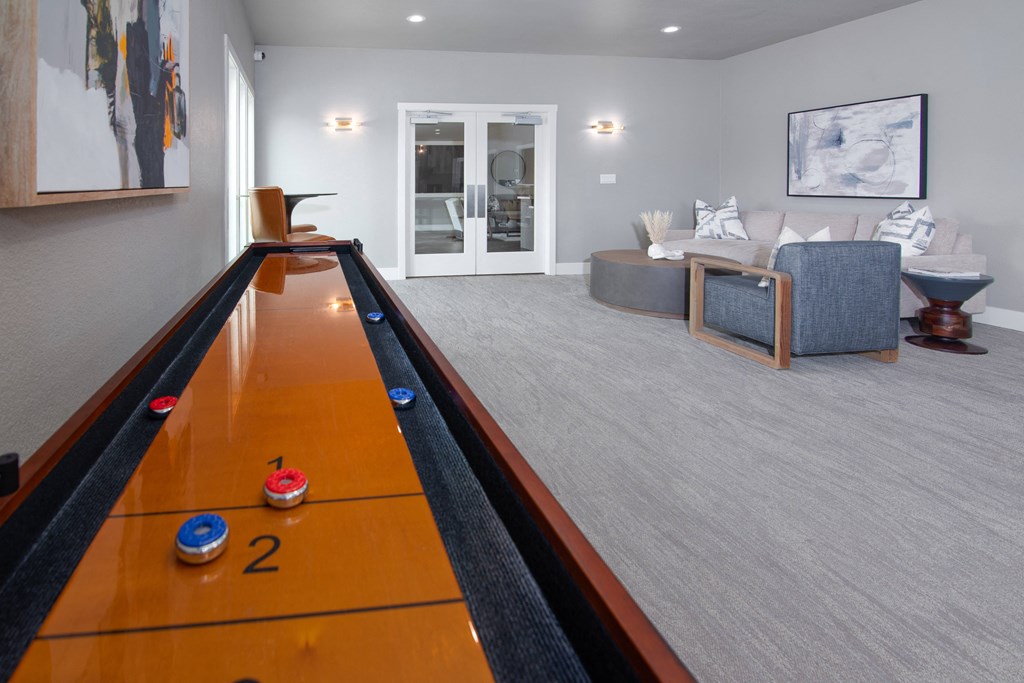 Salty board in resident lounge with seating at Rivercrest Apartments, Sacramento, 95826 