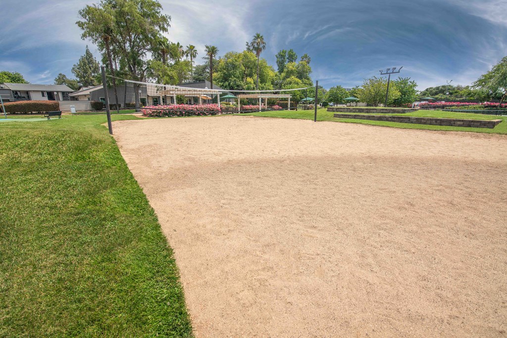 A sand volleyball court at Rivercrest Apartments, California, 95826