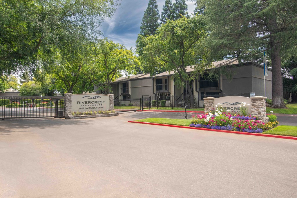 Monument sign and entrance to community at Rivercrest Apartments, Sacramento, CA 95826 