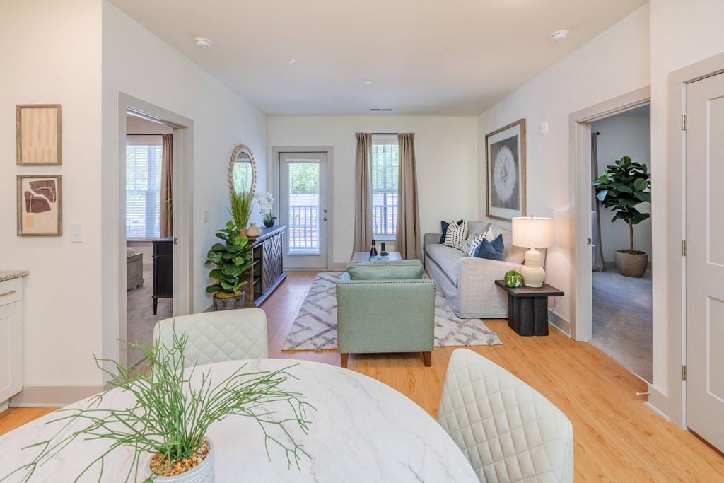 a living room with a couch and a table