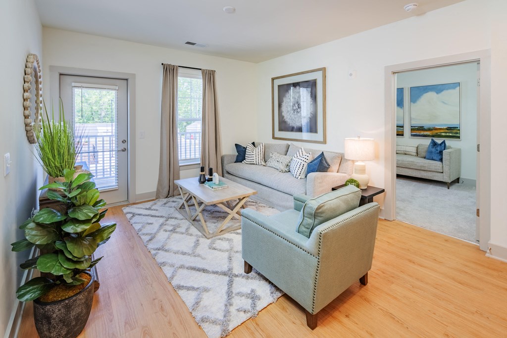 a living room with a couch and a chair