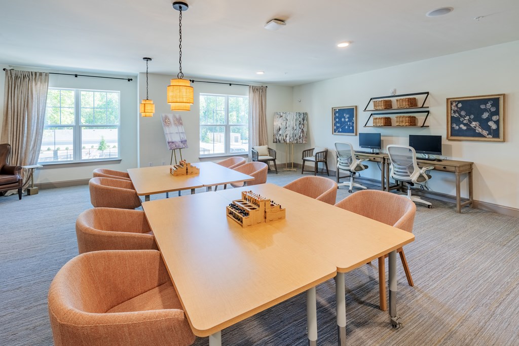 a conference room with a large table and chairs