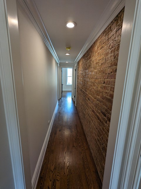 Exposed Brick Hallway