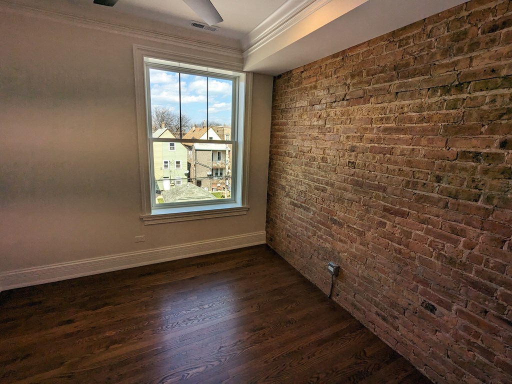 Exposed Brick Bedroom