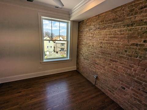 Exposed Brick Bedroom
