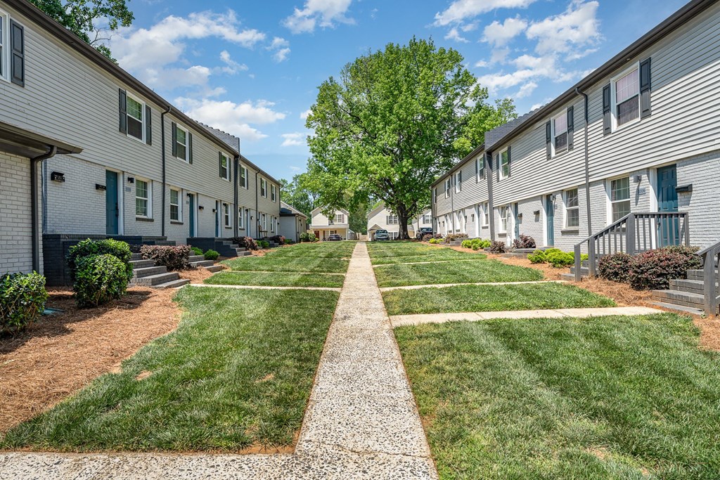 our apartments are located in a quiet neighborhood with a lawn