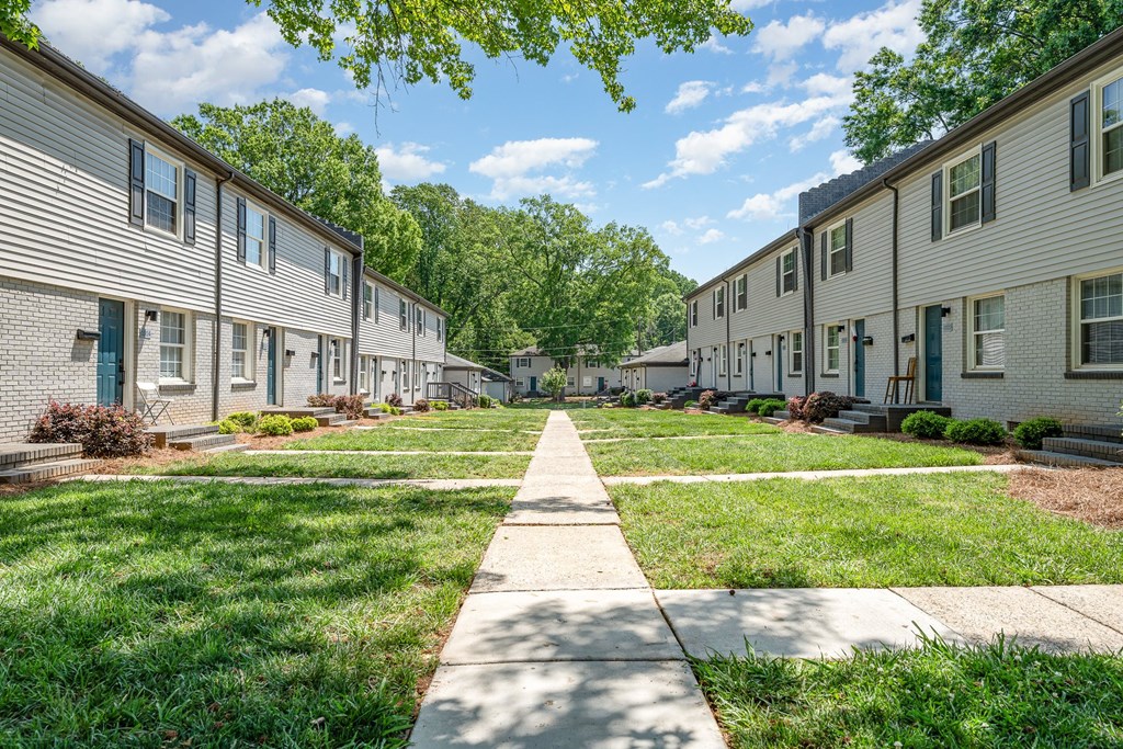 our apartments are located in a quiet neighborhood with lawns and trees