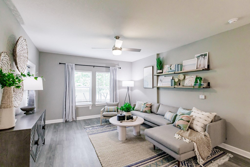 a living room with a couch and a table