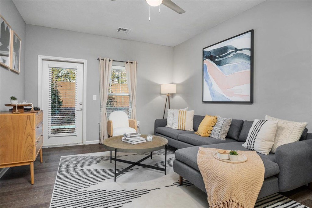 a living room with a couch and a table