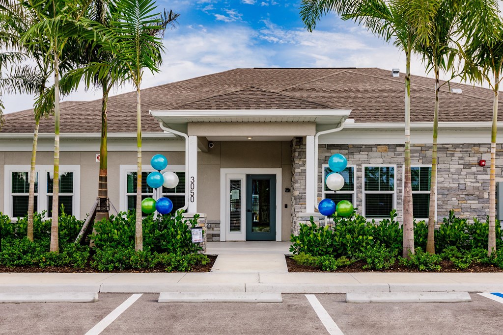 exterior view of Vantage Apartments clubhouse in cape coral, fl