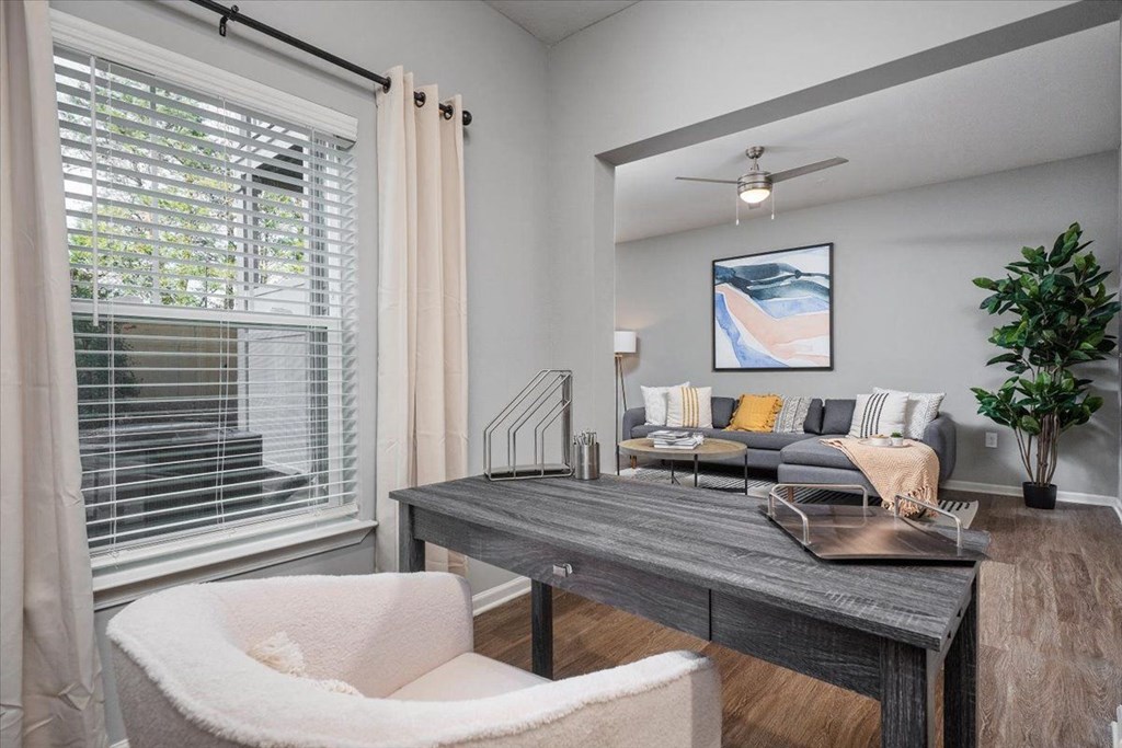 a living room with a couch and a table