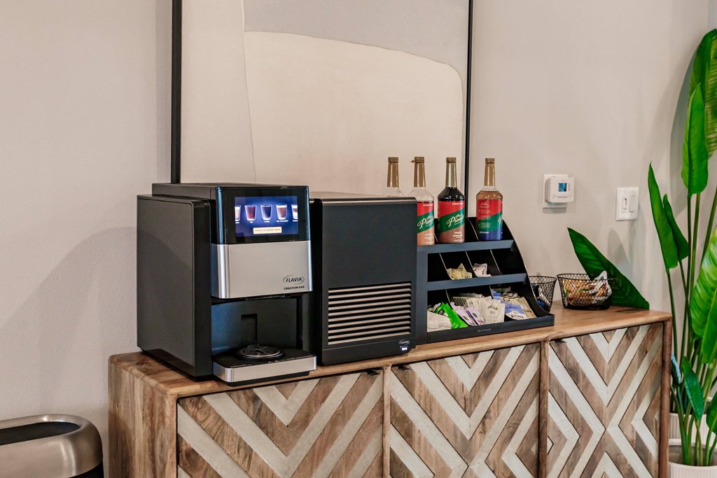 a coffee machine on a counter at Vantage Luxury Apartments in  Cape Coral, FL