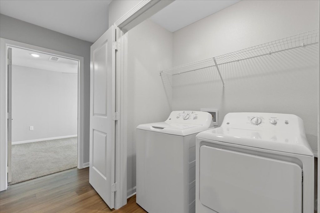 A laundry room with a washer and dryer.