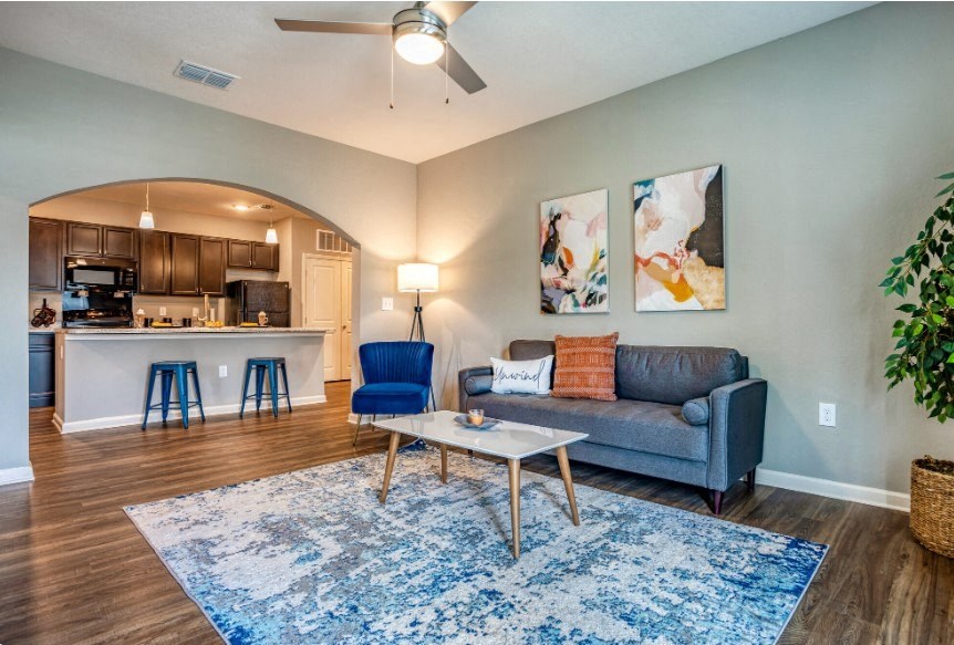 Living Room with couch, table, and chairs at the Flats at Sundown in North Port, Florida