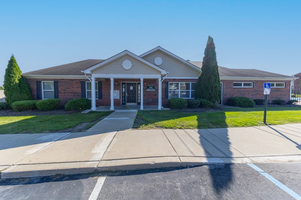 Exterior view of the retreat apartments clubhouse building in michigan city