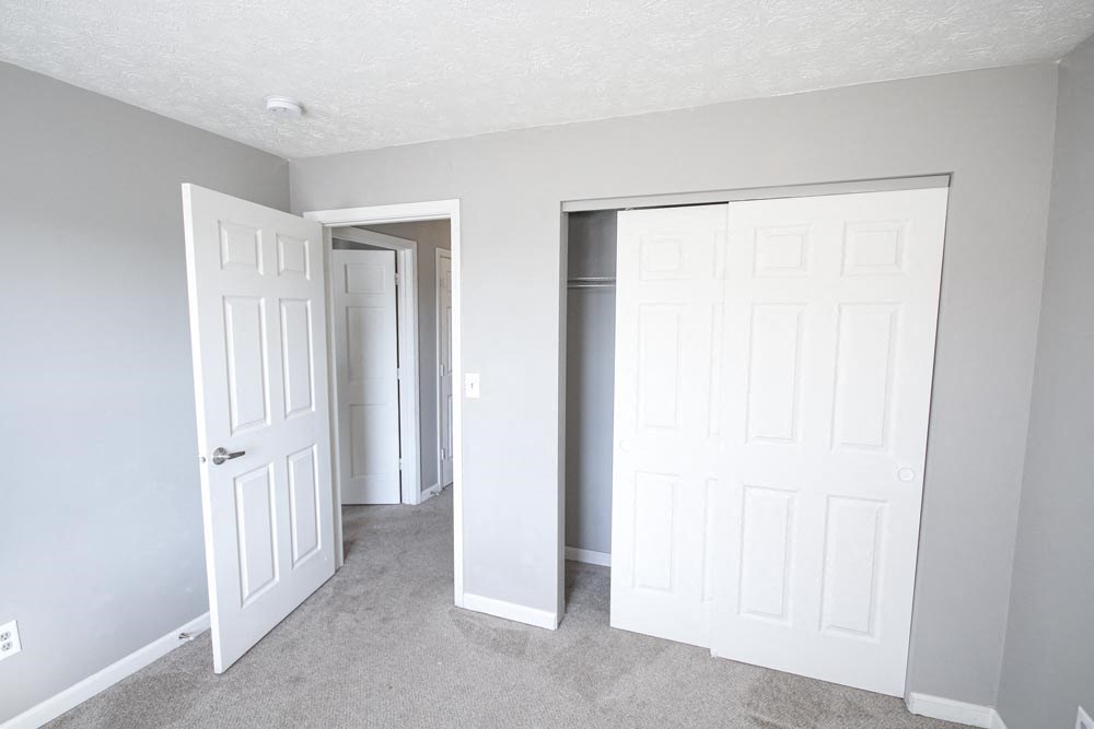 An empty bedroom with closet at Cobalt Apartments in Kokomo, Indiana