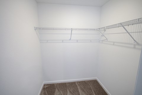 An empty closet with shelving indmiller Pointe apartments in Columbus, Ohio