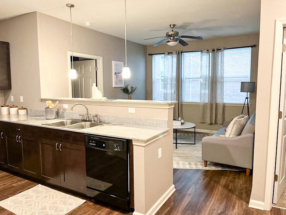 A kitchen counter and sink at The Lofts at Canterbury in Slidell, Louisiana