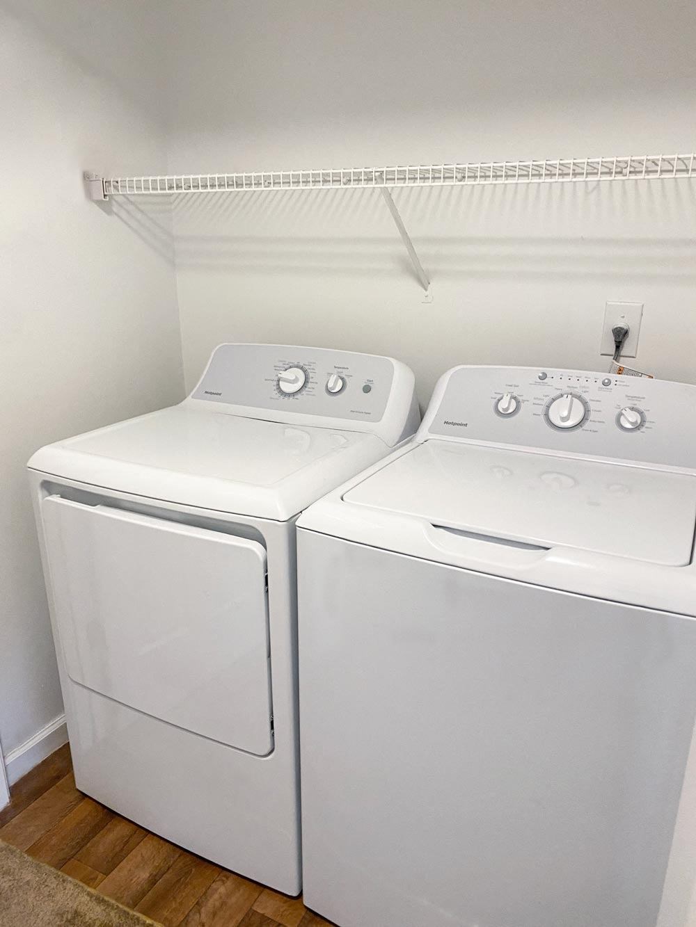Washer and dryer in a small room at Cobalt Apartments in Kokomo, Indiana