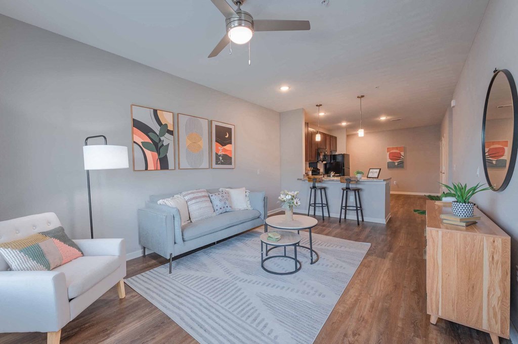 a living room with a couch and a chair