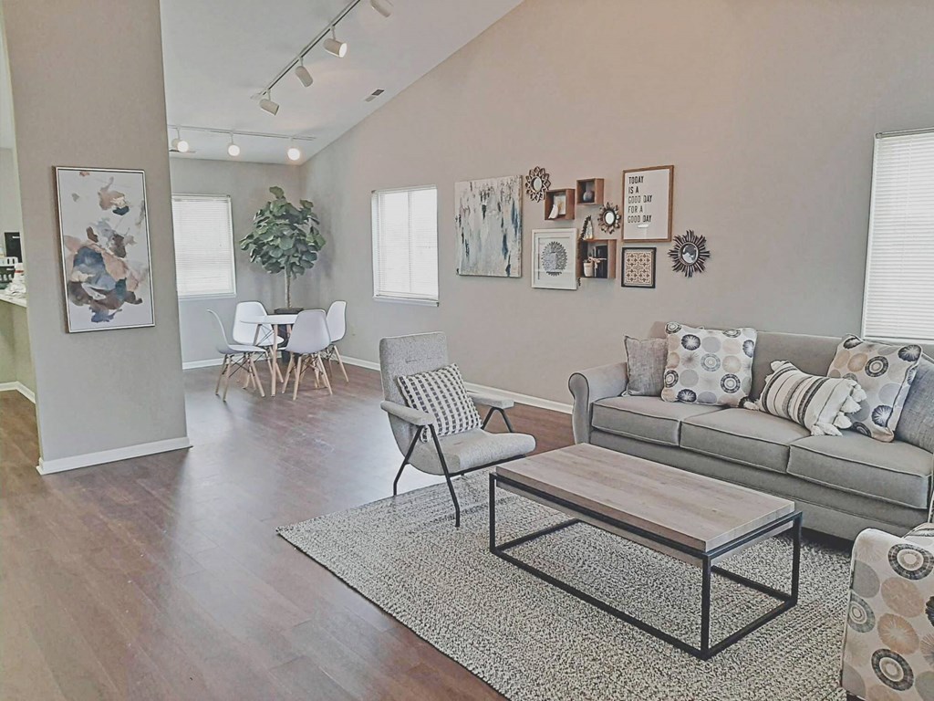 Clubhouse living room with a couch and a coffee table at Frankfort Place apartments in Frankfort, Indiana