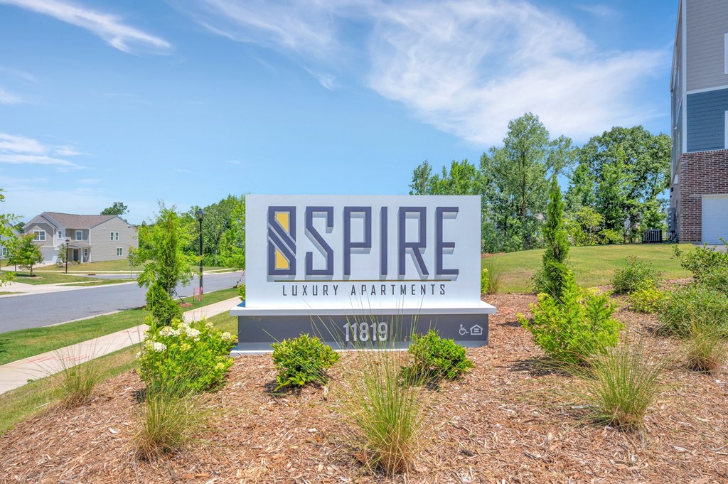 a sign for spire apartments in charlotte, nc