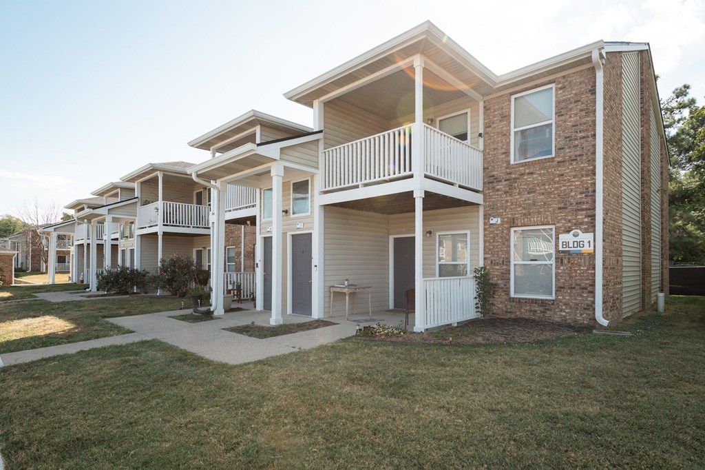 Apartment complex with a sign that says "Bldg 1".