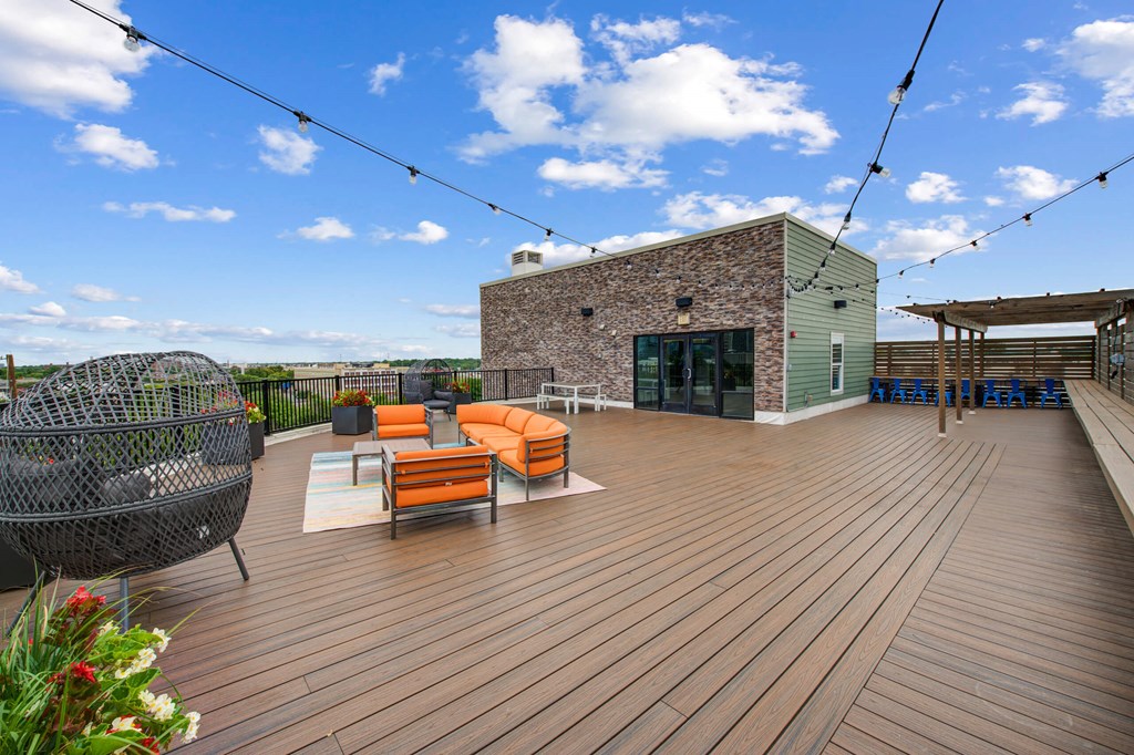 a roof deck with furniture at The Vue Luxury apartments in Indianapolis