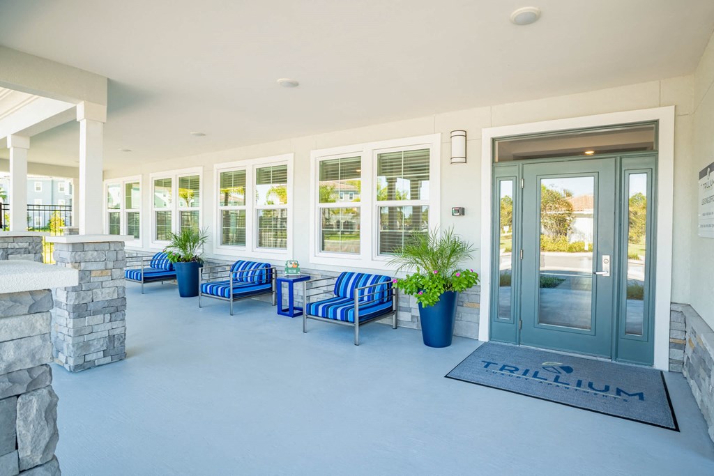 Chairs outside of a building at Trillium apartments in Melbourne fl