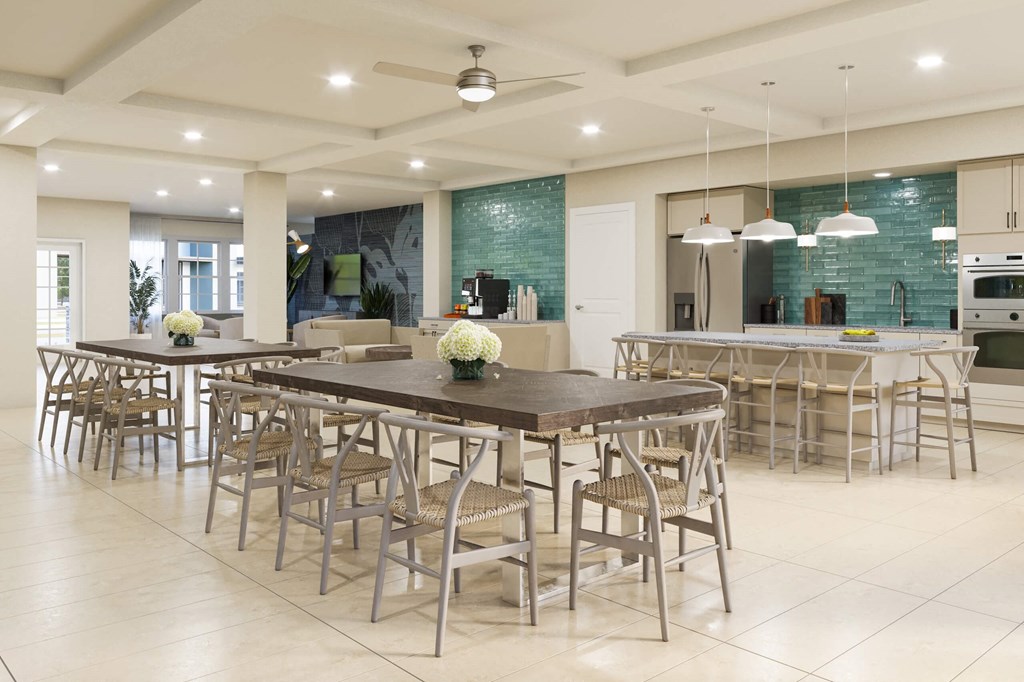 Rendering of Vanguard apartments clubhouse with long tables, chairs, and kitchen