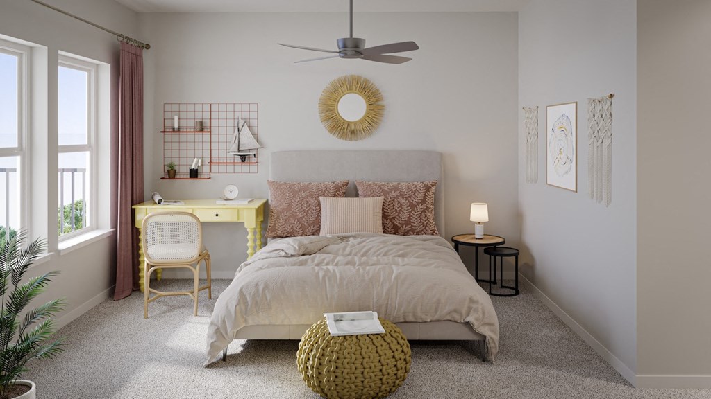 a bedroom with a bed and a ceiling fan