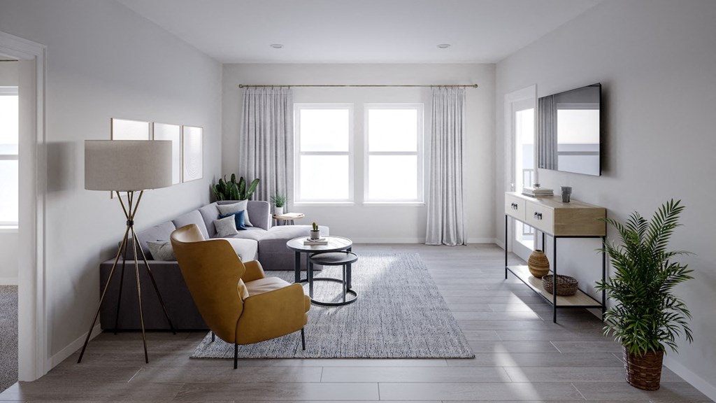 a living room with a couch and a table