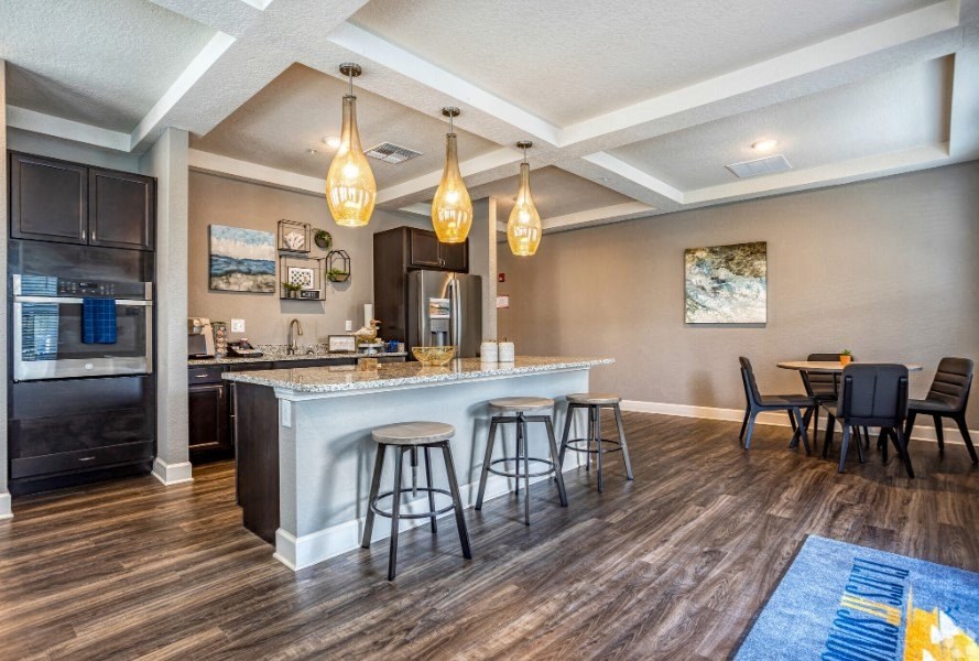 The kitchen int he community clubhouse at the Flats at Sundown in North Port, Florida