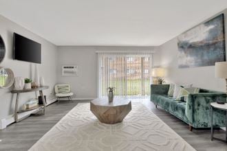 Living Room With Balcony at The Preserve at Woodfield, Rolling Meadows - Photo Gallery 5