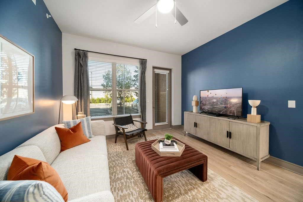 a living room with a couch and a tv