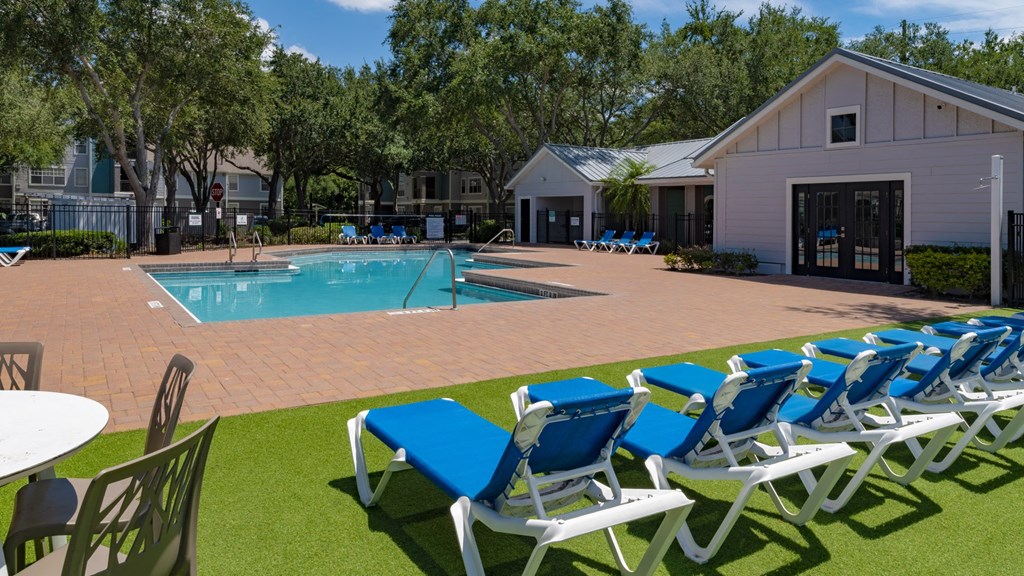 our apartments have a large pool and lounge chairs