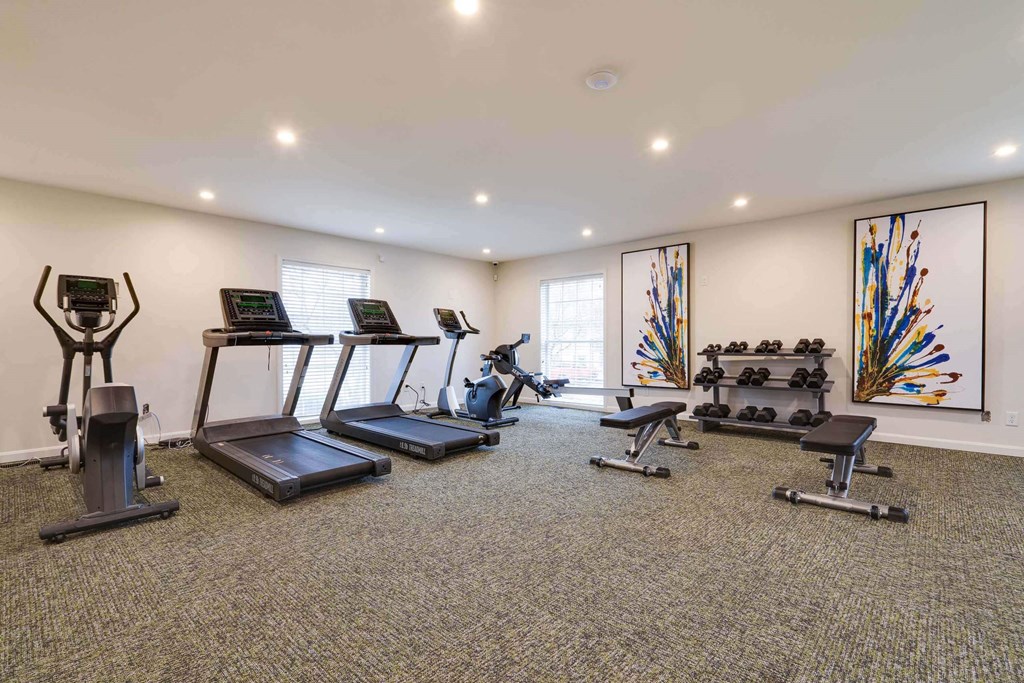 our apartments have a gym with a treadmill and elliptical machines at Station JTown, Louisville