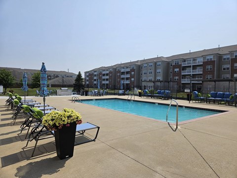 Pool With Relaxing Chairs at Vita on Grant, Merrillville Indiana