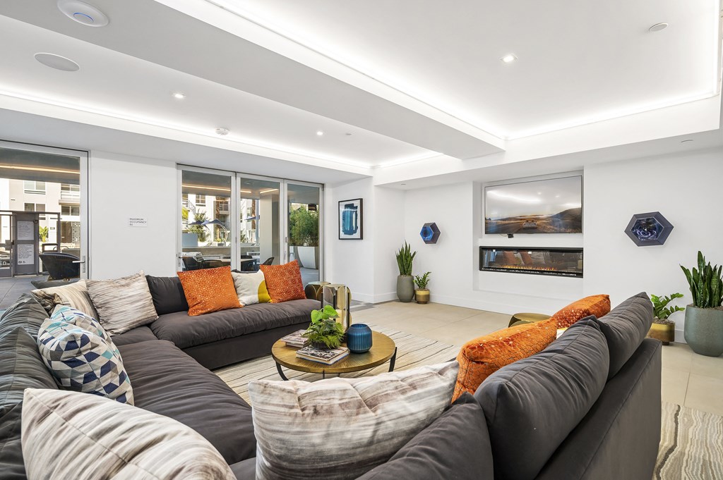 a living room with couches and a coffee table