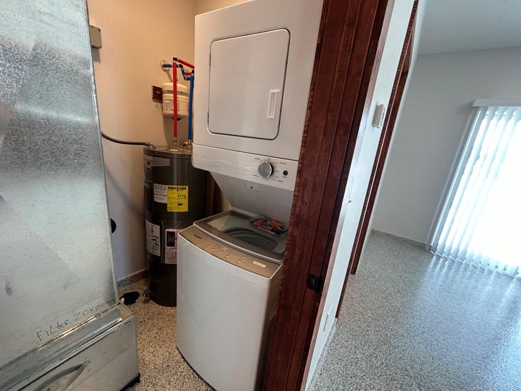 a washer and dryer in a room with a window