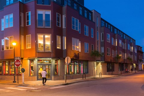 a building on a city street at night