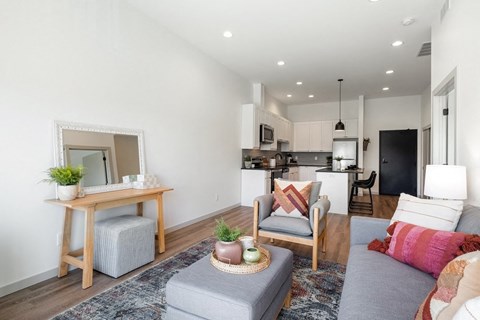 a living room with a couch and a table